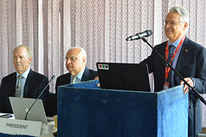 : Emilio Perucca, MD, (right) president of the International League Against Epilepsy, welcomes the WFN Council of Delegates to Prague. Also pictured (from left): William Carroll, MD, WFN vice president, and Raad Shakir, MD, WFN president.