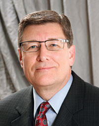 John D. England, MD